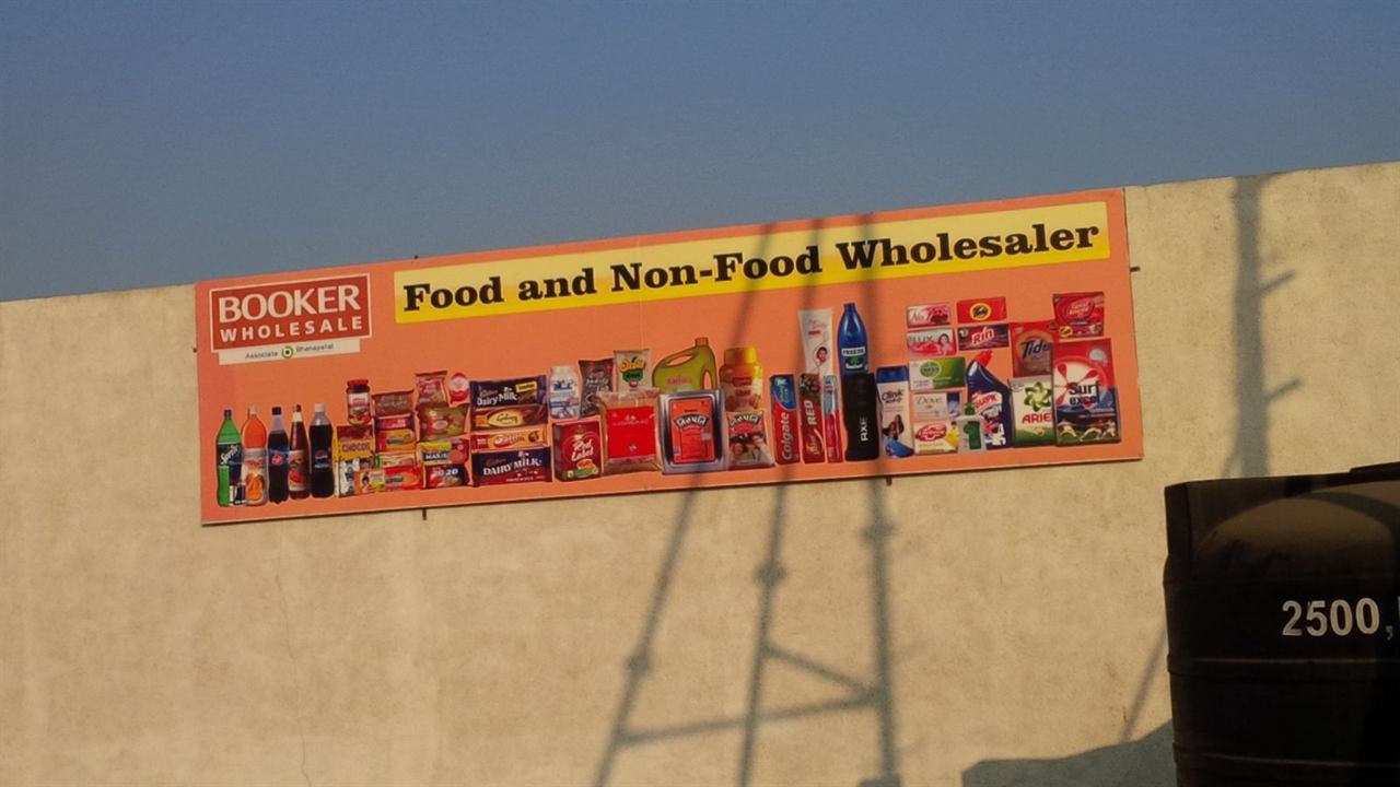 Booker Wholesale printed flex banner mounted on a wall